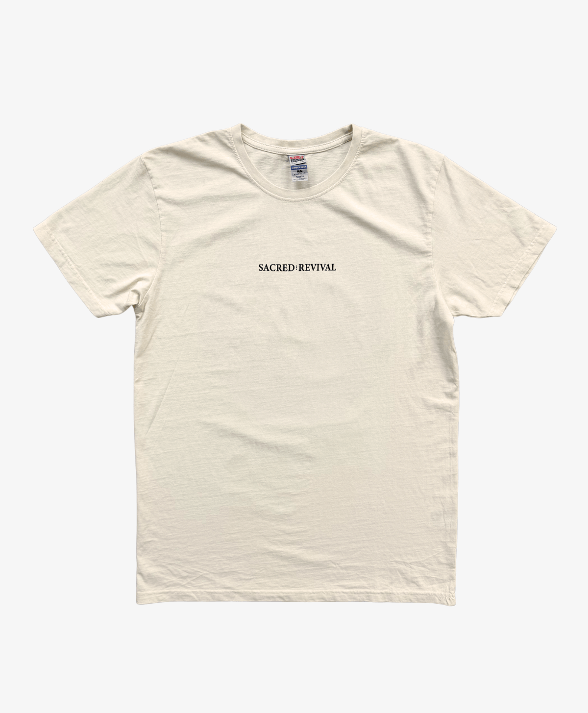 Cream Balanced tee, front view, with the Sacred Revival wordmark on the chest