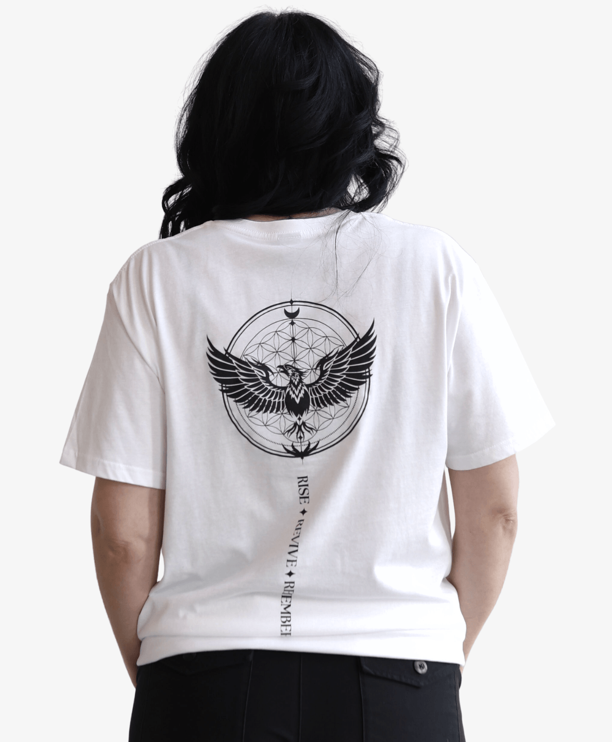 Woman seen from behind wearing the white Phoenix Rising tee