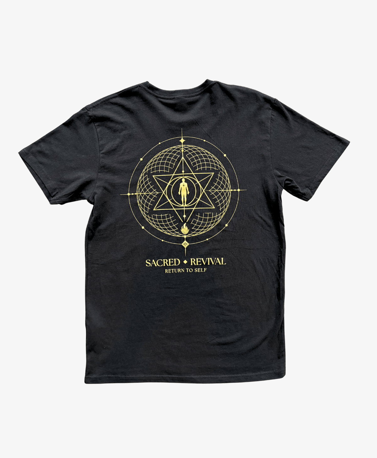 Black Return to Self tee, back view, with the gold geometric symbol above the Sacred Revival wordmark