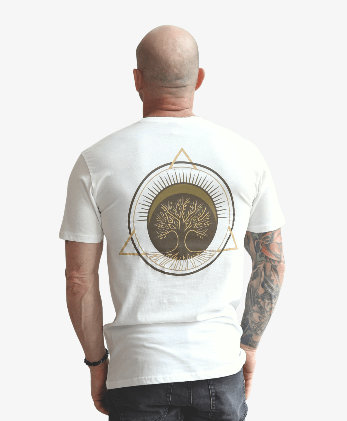 Man seen from behind wearing the white Tree of Life tee with the full-colour symbol